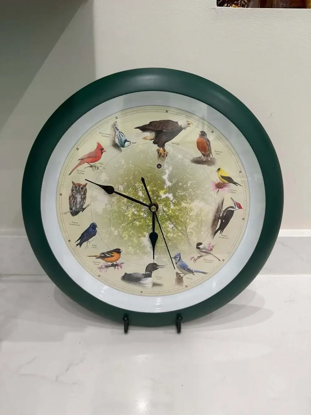 Singing Bird Clock 13” Wall Hanging w/ 12 Hourly Songs & Light Sensor Mute